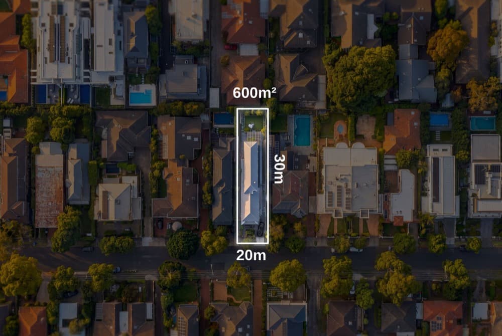 A top down aerial with the lot boundary marked and labelled, 600 square metres at 30 by 20 metres